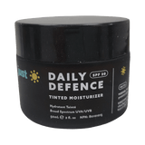Black jar of Daily Defence Tinted Moisturizer with SPF 30 on a white background