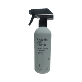 All-purpose cleaner bottle labeled 'Guests on Earth' on a white background