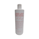Bottle of 'Hydrate + Repair Natural Moisturizing Curl Shampoo' on a white background